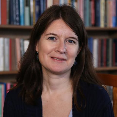 woman sitting at a laptop