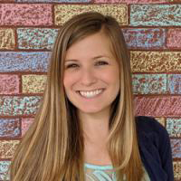 woman sitting at a laptop