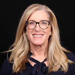 woman sitting at a laptop