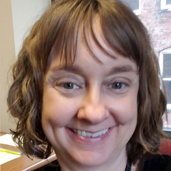 woman sitting at a laptop